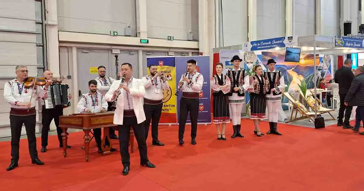 Cinematic close-up of traditional Romanian folk dancers in authentic handmade costumes performing a high-energy traditional dance.